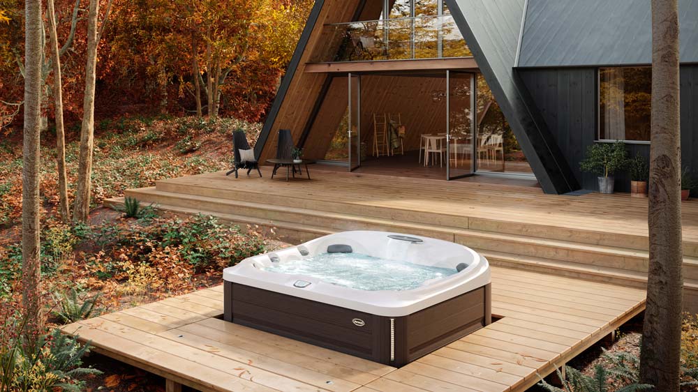 Hot tub outside cabin during the fall