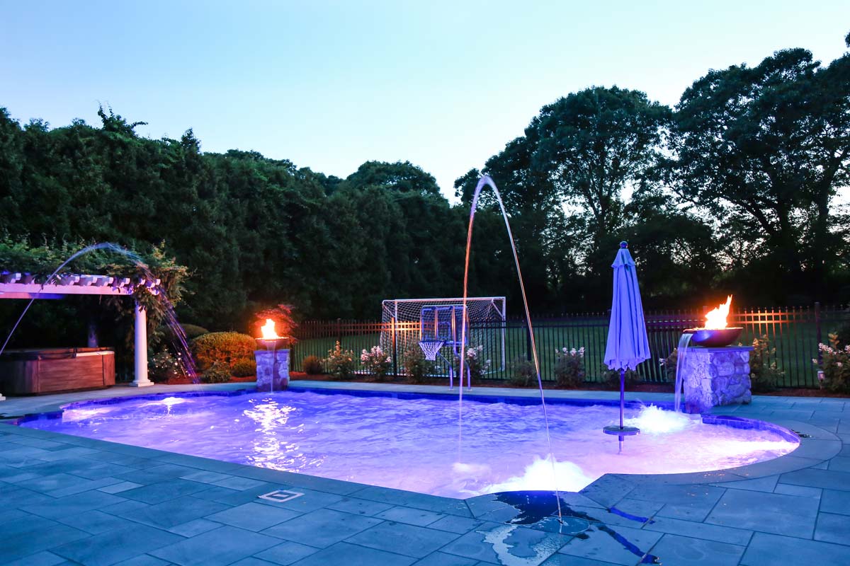 New pool with water jets at night