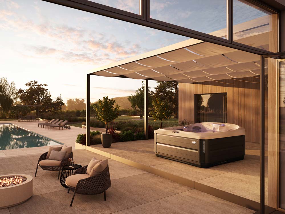Hot tub in backyard during sunset