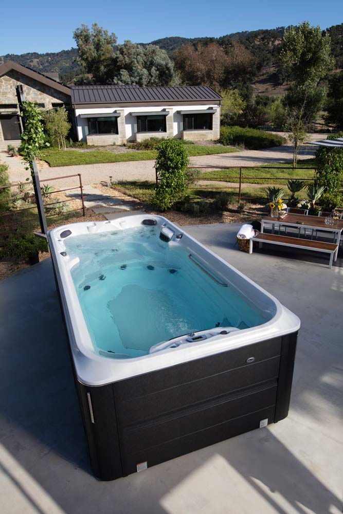 Small hot tub in backyard