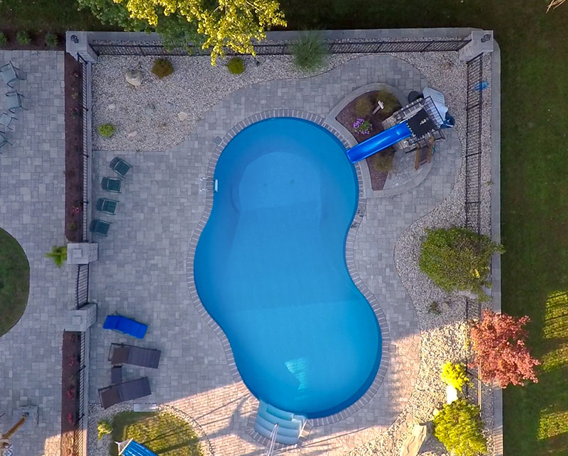 Aerial view of new pool in backyard