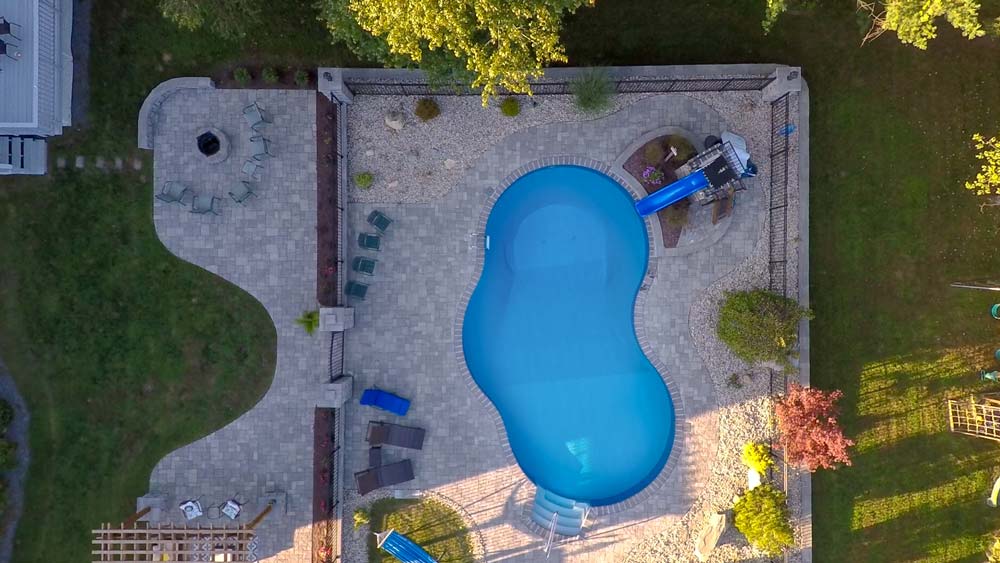 Aerial view of new pool in backyard
