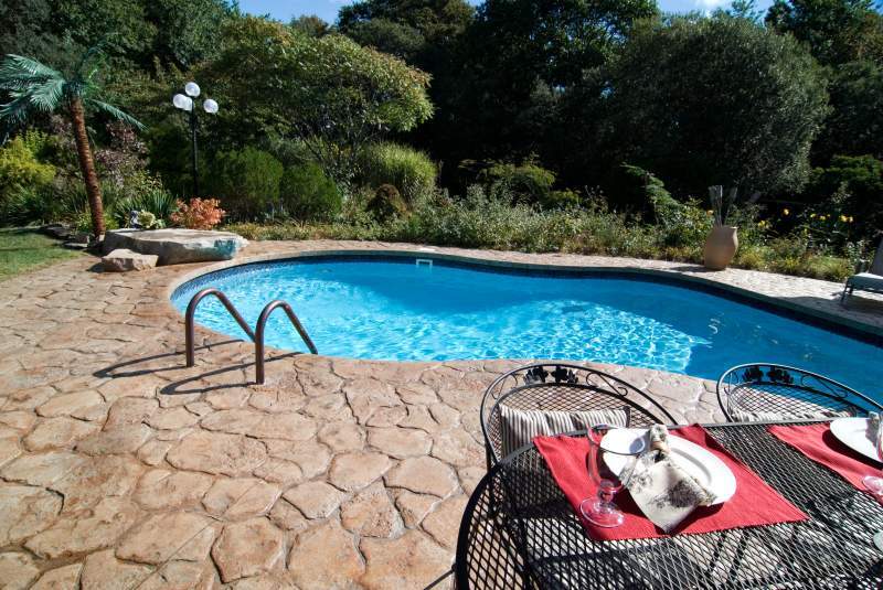 Beautiful vinyl pool in backyard
