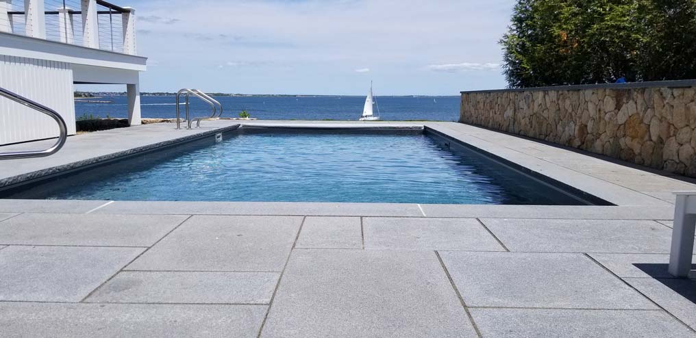 New pool in backyard next to the ocean
