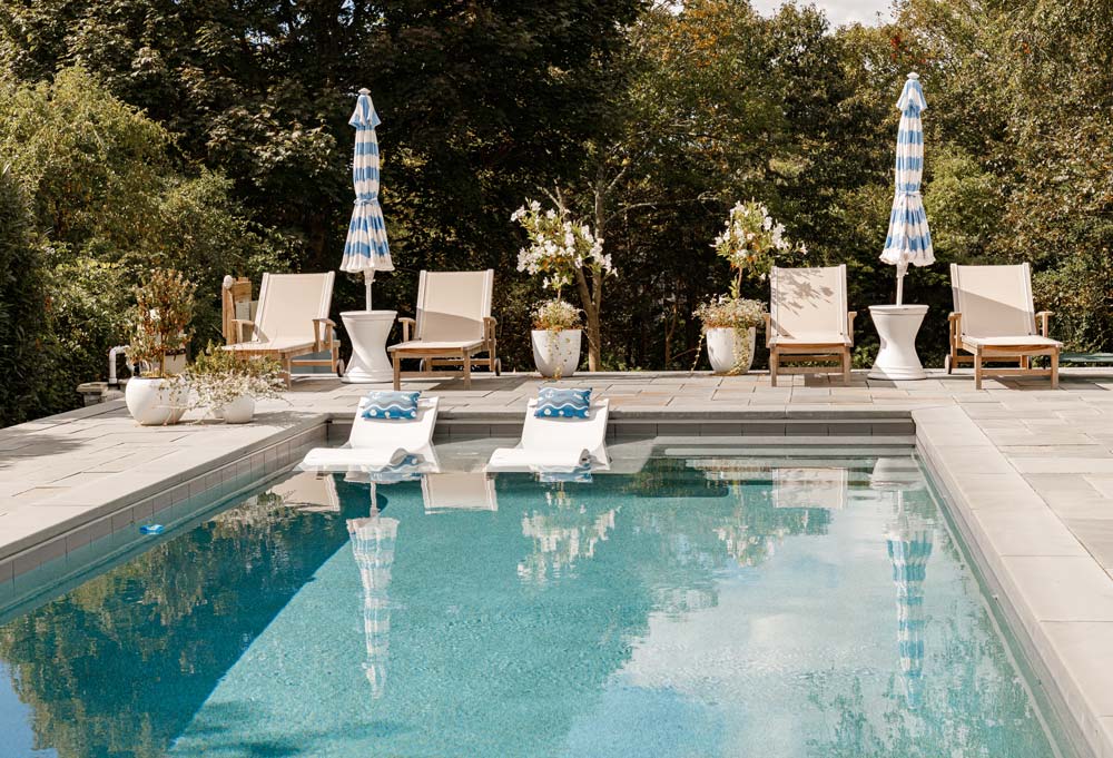 New pool with steps and a tanning ledge on the side