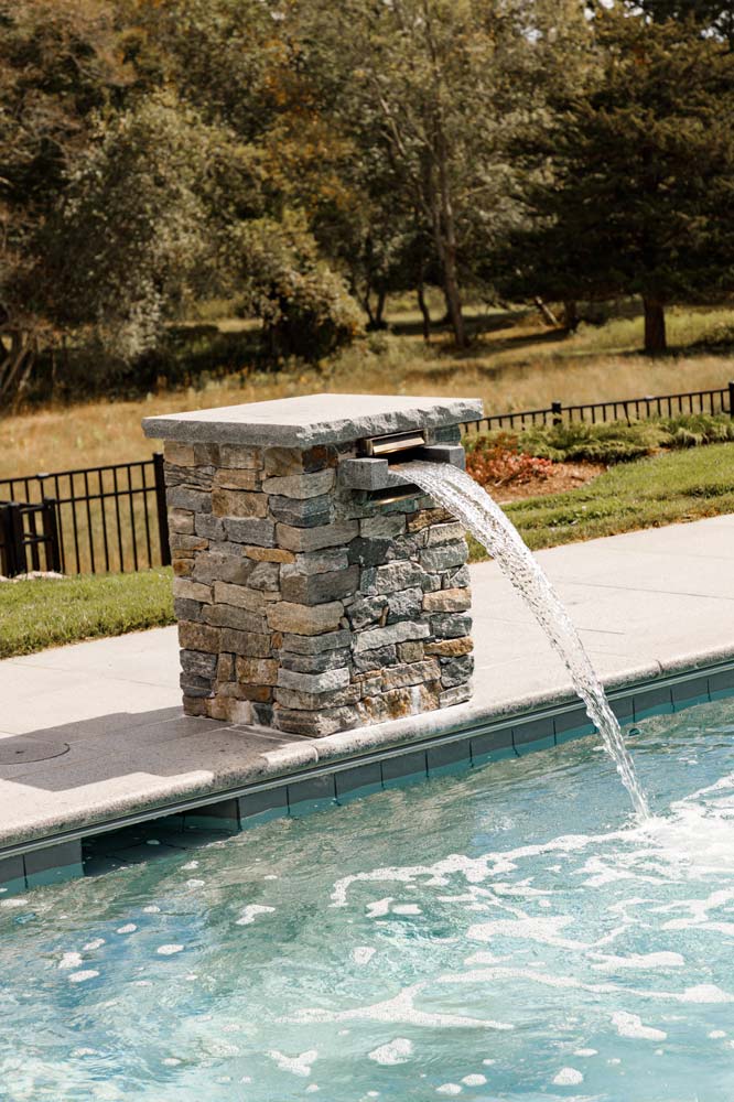 Beautiful waterfalls on the side of new pool