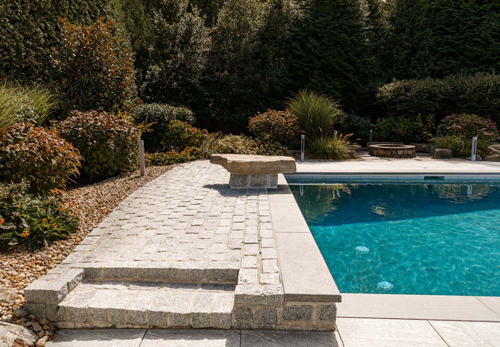 Decorative stone next to the pool