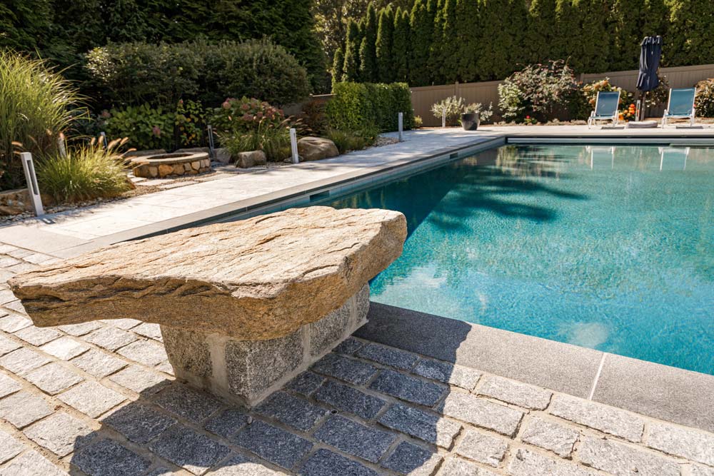 Decorative stone next to the pool