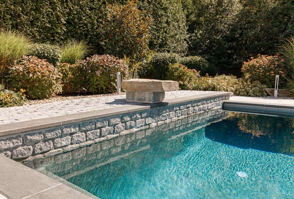 Decorative stone next to the pool